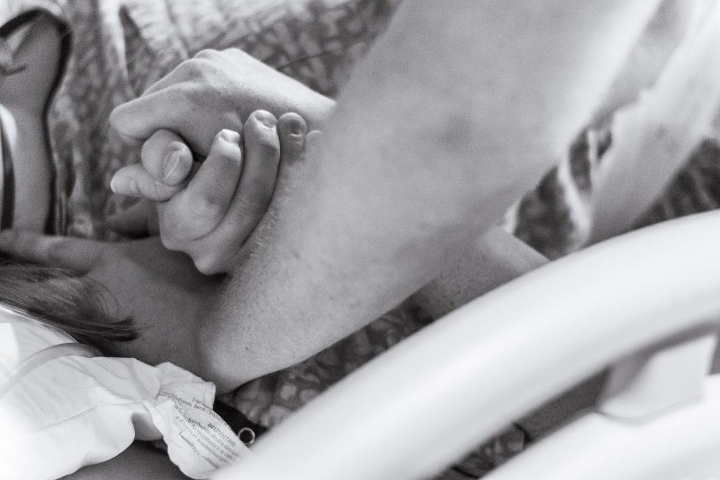 holding hands during labor