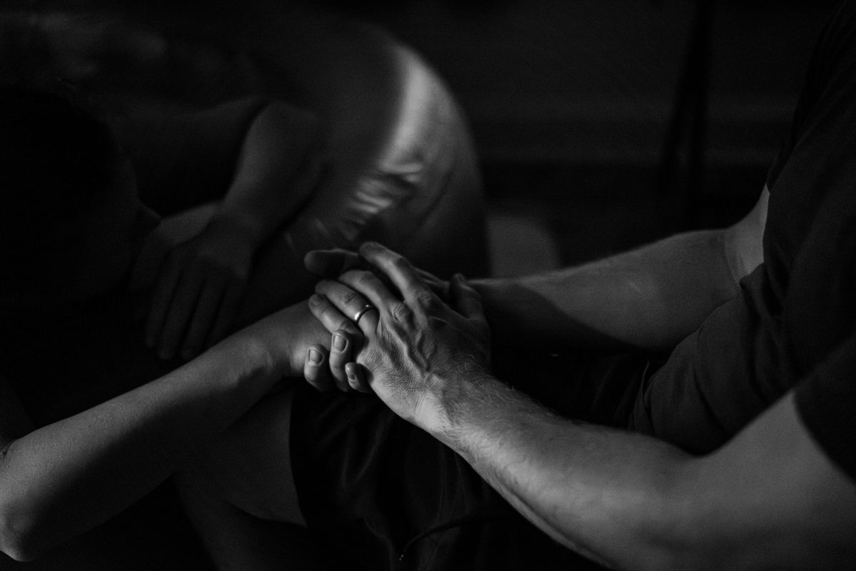 mom and dad holding hands
