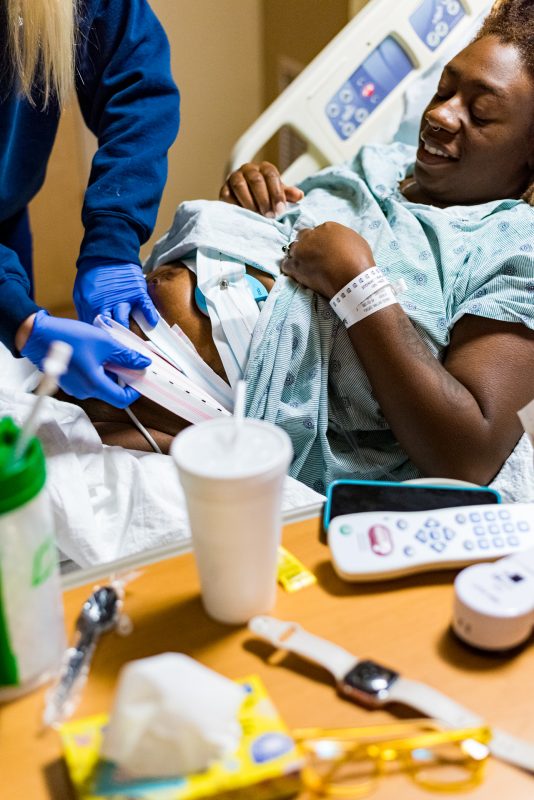 Norwood Birth-1 Nurse attending to pregnant woman