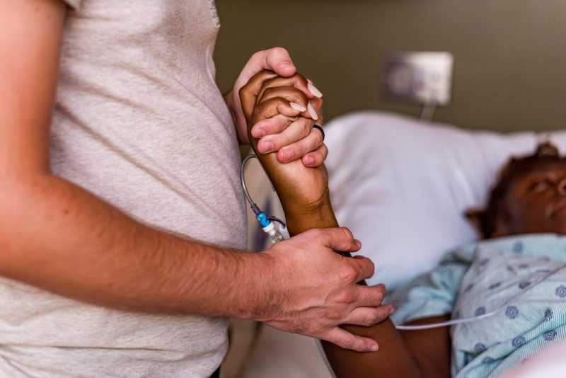 Norwood Birth-42 Man holding wife's hand